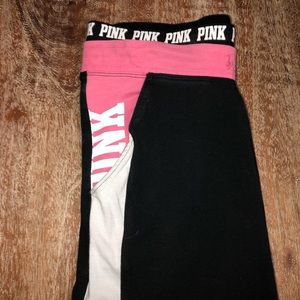 pink vs black leggings, white stripe, pink pockets